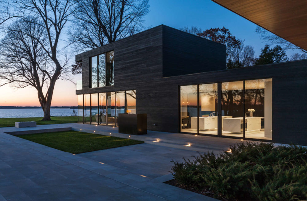 Framing the Landscape: 10 Timber Lake House Designs