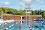 Outdoor Olympic-sized swimming pool restored to former glory with Kebony cladding