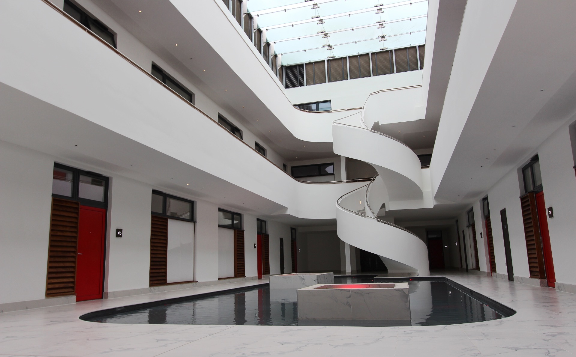 Kallisto Stairs deliver breath-taking centre piece for Weston Homes development. @MilbankConcrete